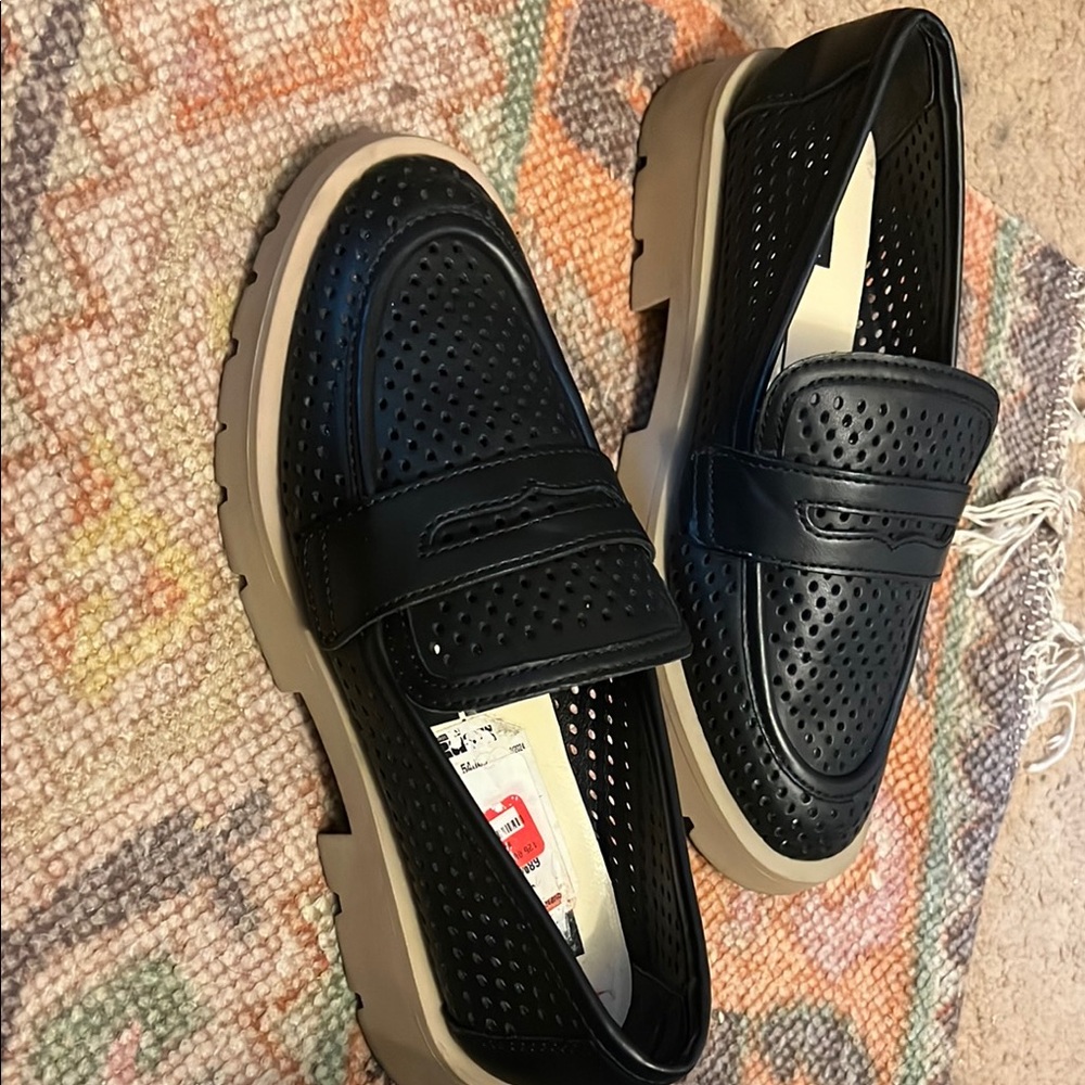 Dolce Vita Black and Tan Loafers with Sporty Perforations